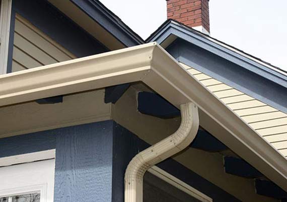 Installed home roof gutter