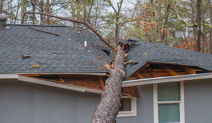 storm damaged house roof